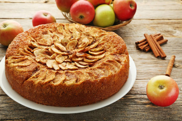 istock Apple cake in plate on grey wooden table 976581834
