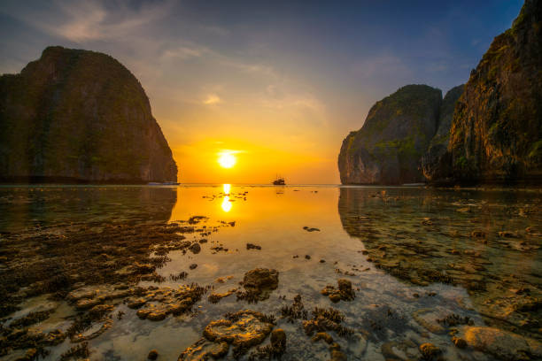 istock Sunset at the Maya beach on Koh Phi Phi island in Thailand 976582234