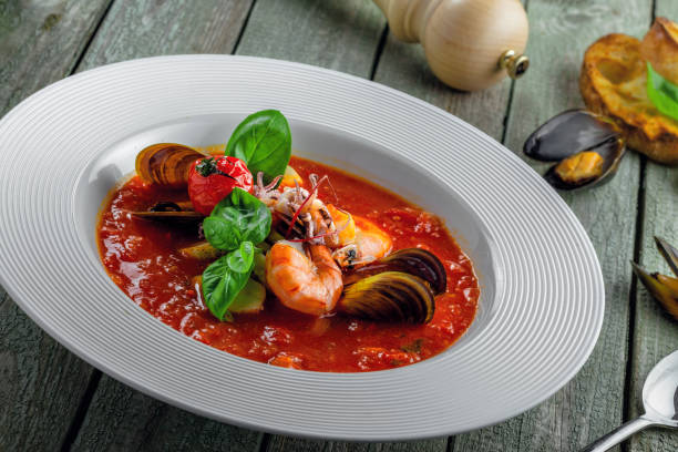istock Tomato stew with sea food 976585332