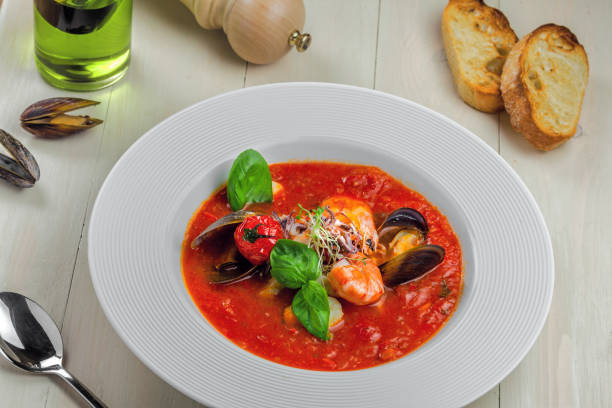 istock Tomato stew with sea food 976585836