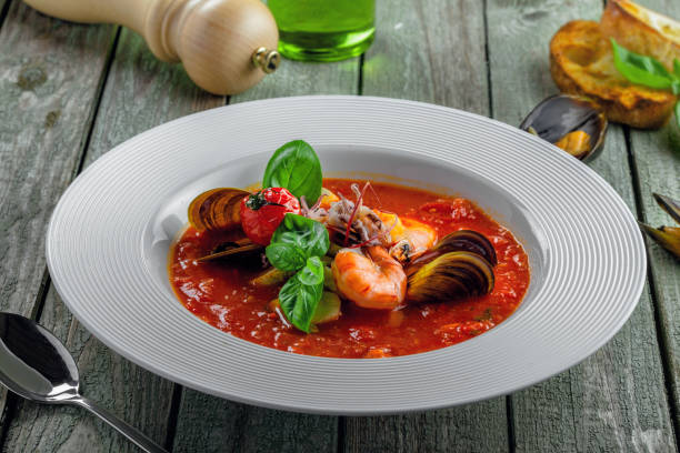istock Tomato stew with sea food 976585964