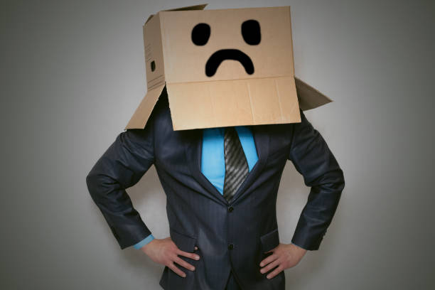 istock Businessman with box. 976588796