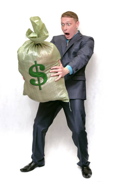 istock Businessman with money bag.  Winner. 976588986