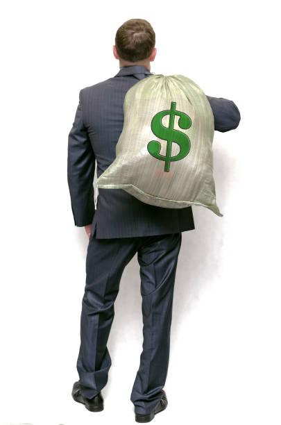 istock Businessman with money bag.  Winner. 976589062