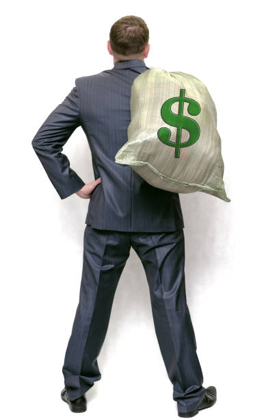 istock Businessman with money bag.  Winner. 976589078