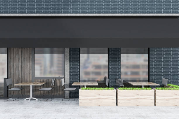 istock Black brick and wood restaurant exterior 976597766