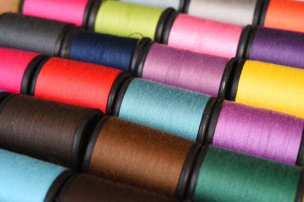 istock close up of colorful thread spools 976598408