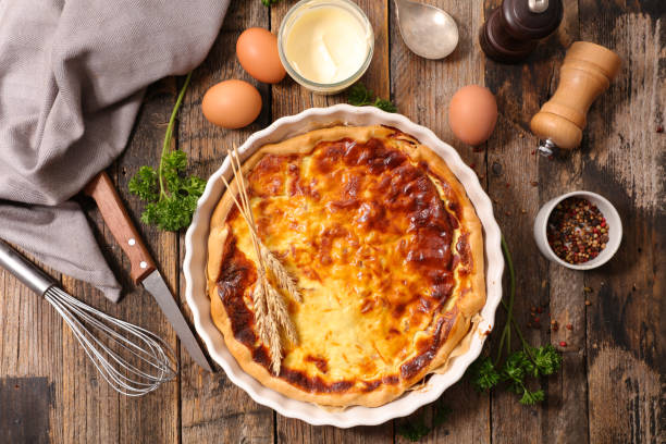 istock homemade quiche with cream, cheese and bacon 976600686