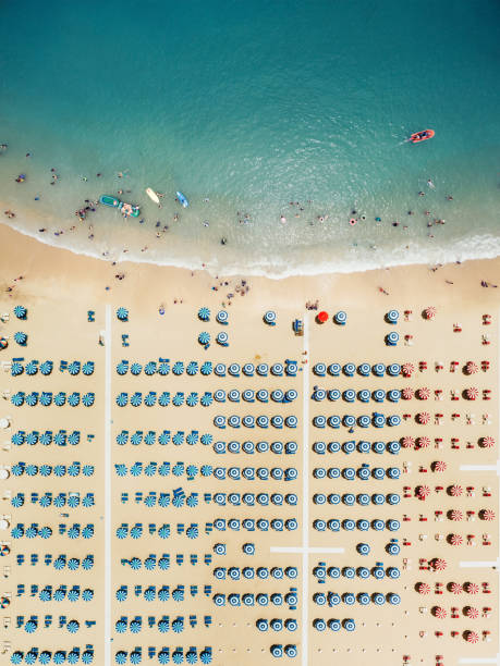 Aerial view of the beach Aerial view of the beach in Rimini, Italy beach umbrella aerial stock pictures, royalty-free photos & images