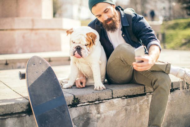 istock Man and dog in the park 976604244