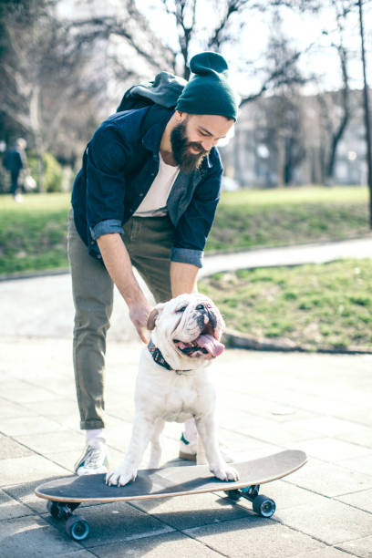 istock Man and dog in the park 976604246