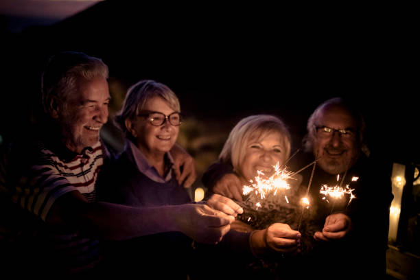 istock two elderly couple retired have fun in the night with lights 976604520