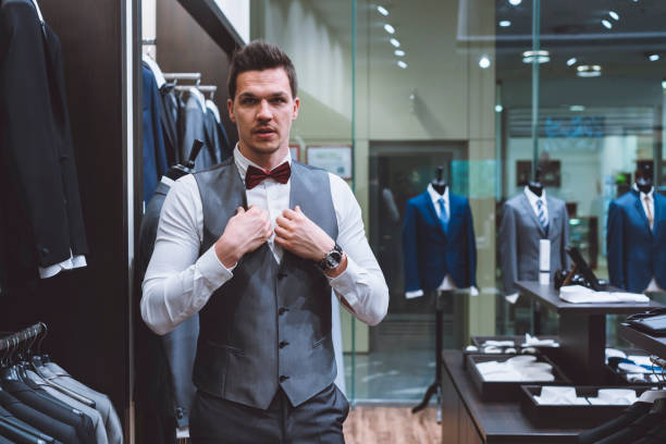 istock Handsome businessman in a boutique 976611182