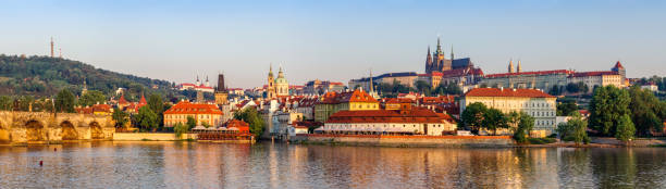panoramic view of vltava River, Mala strana distric and Prague Castle in the morning High resolution panoramic view of vltava River, Mala strana distric and Prague Castle. Czech Republic charles bridge prague stock pictures, royalty-free photos & images