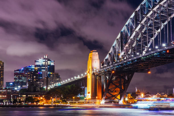 istock Zoomed view on Harbour bridge and Circular Quay at night 976625578