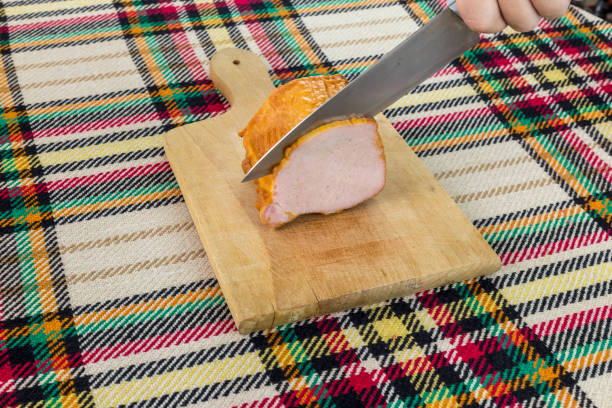 istock Cutting smoked filet 976630316