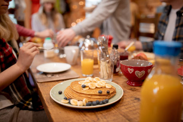istock Pancakes Topped with Fruit and Honey 976630552