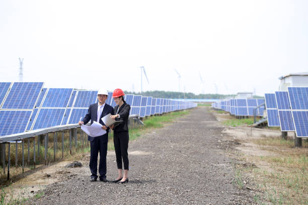 istock Developers visit the photovoltaic power station site 976633350