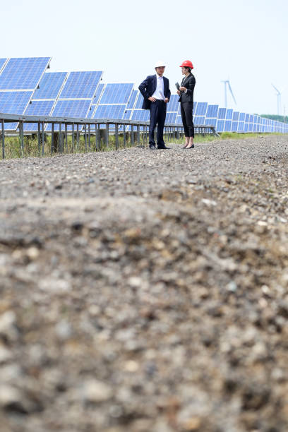 istock Developers visit the photovoltaic power station site 976633366