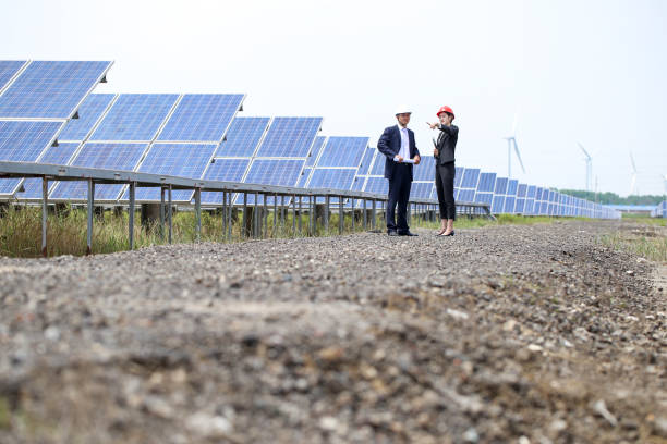 istock Developers visit the photovoltaic power station site 976633368