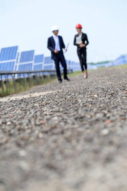istock Developers visit the photovoltaic power station site 976633378