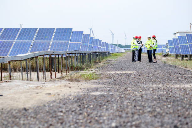 istock Engineers and business developers discuss construction plans at the new power and energy equipment base. 976633494