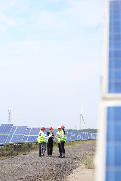 istock Engineers and business developers discuss construction plans at the new power and energy equipment base. 976633500