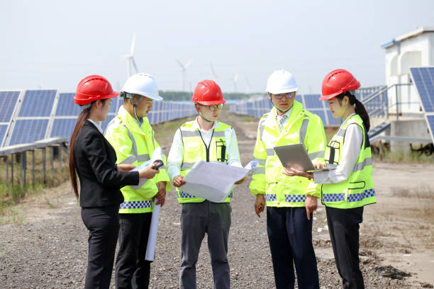 istock The engineers discussed the construction plan at the electrical equipment base. 976633692