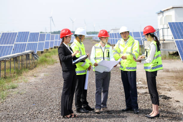 istock The engineers discussed the construction plan at the electrical equipment base. 976633702
