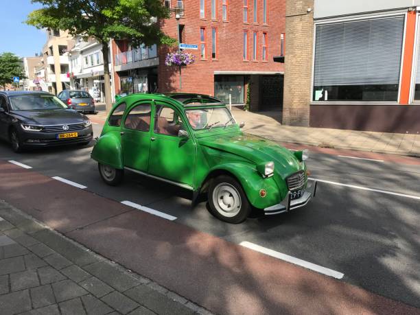 Vintage car Brunssum, the Netherlands, - June 15 20815. Vintage car in the city traffic. 1960 1969 photos stock pictures, royalty-free photos & images