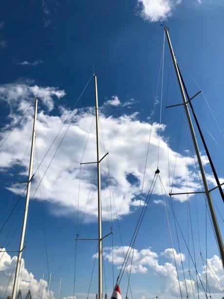 istock Sailboat mast under the blue sky 976645616