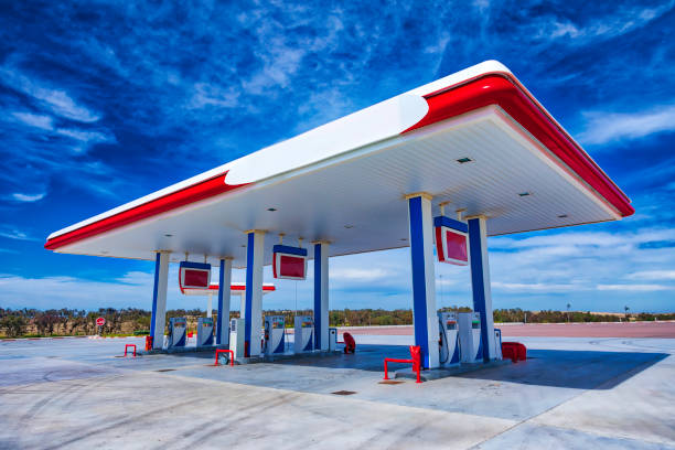 modern red and white petrol station in the desert