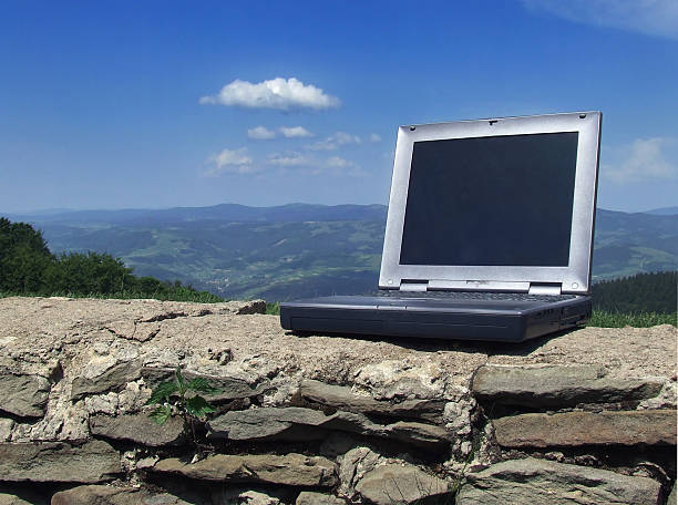 istock Laptop against the sky 97665111