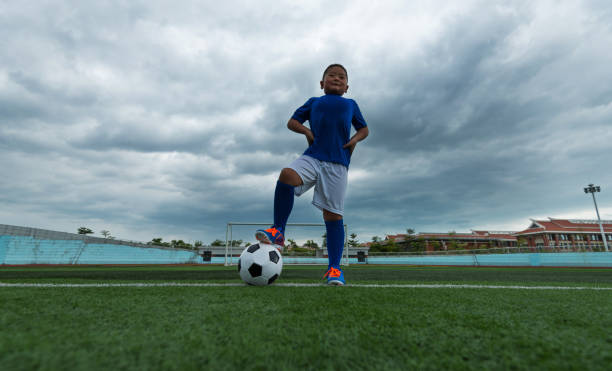 istock Young football player waiting for kick off 976656688