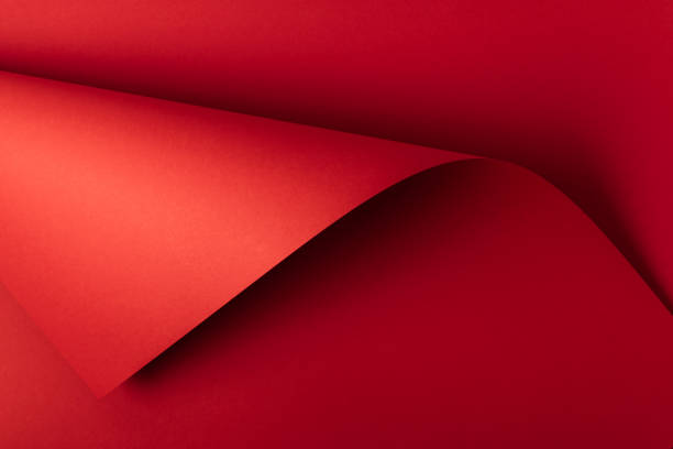 istock bright red decorative paper background 976666734