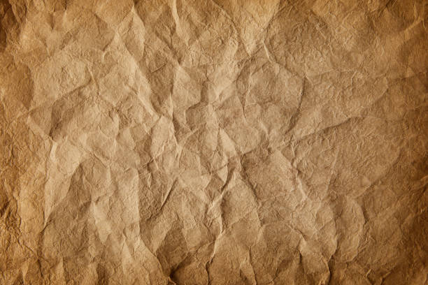 istock full frame image of old crumpled paper background 976683520