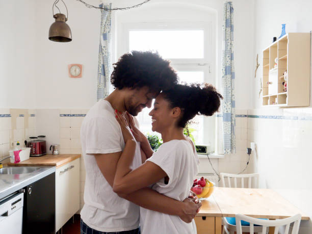 istock Morning love, couple in kitchen 976692300