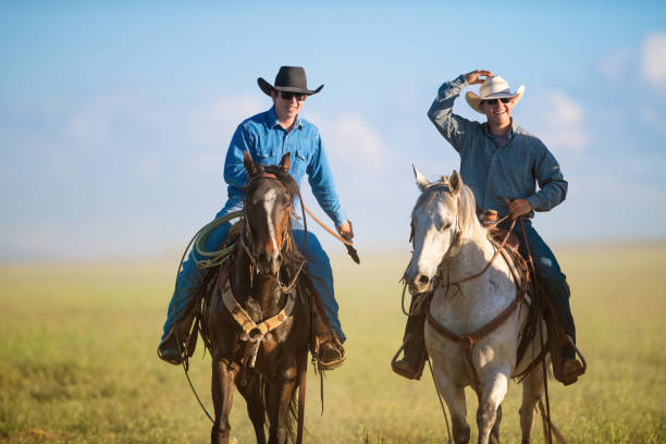 istock Cowboys Horseback Riding 976734254