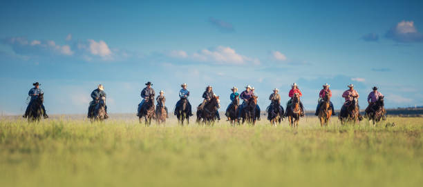 istock Cowboys Horseback Riding 976734558