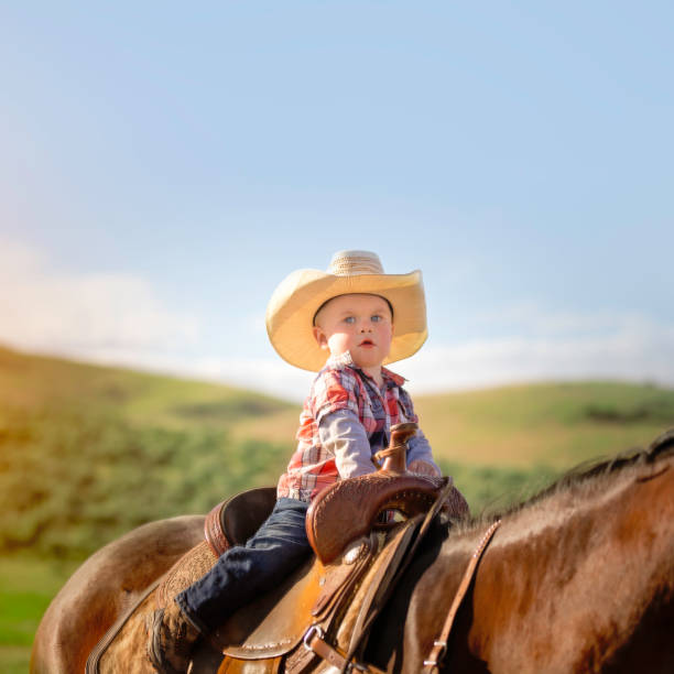 istock Little boy horseback riding 976734942