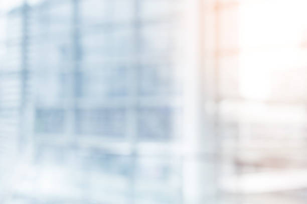 istock Blurred abstract wall building with big window glass background.material decoration design 976736704