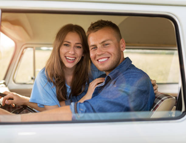 istock Young couple out on a road trip 976743142