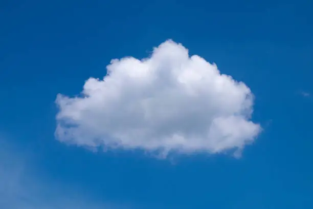 Photo of One nice cloud on the blue sky background