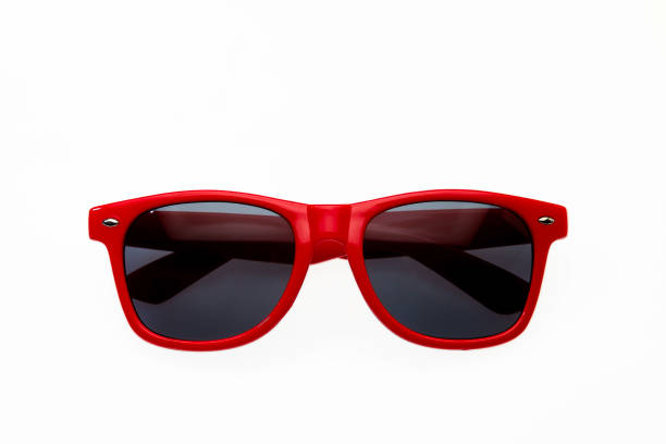 Dark red sunglasses on white background stock photo