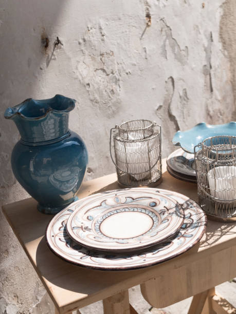 istock composition of dishes and lanterns with a blue jug. 976784110