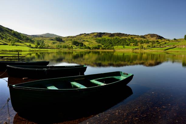 dinghies awaiting the fishermen - watendlath imagens e fotografias de stock