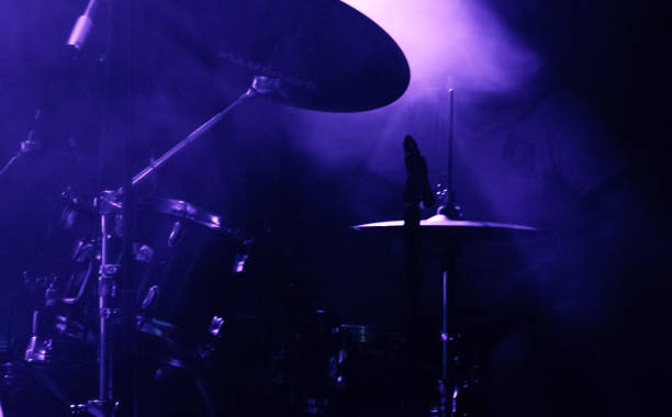 istock Silhouette drummer on stage, club light 976805994