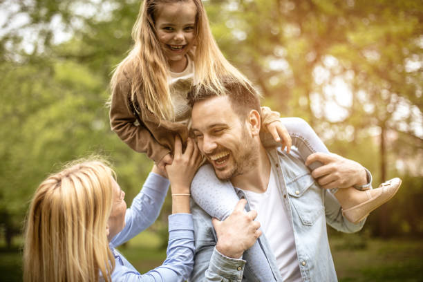 istock Young family at park. 976807750