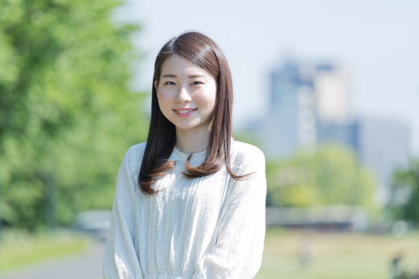 笑顔を持つ女性 - 女性　日本人 ストックフォトと画像