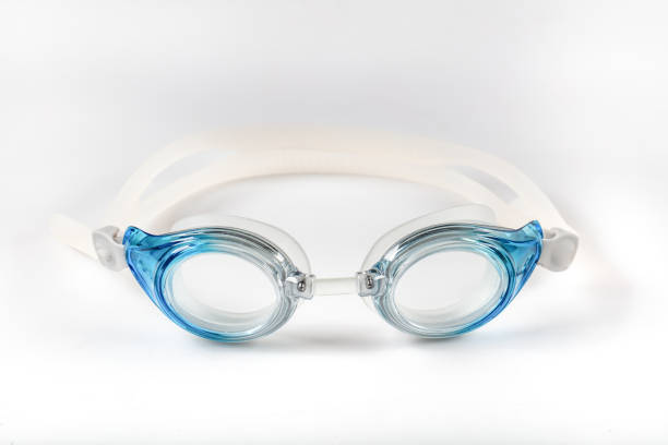 istock Wet blue goggles for swimming. Isolated on white background. 976812264